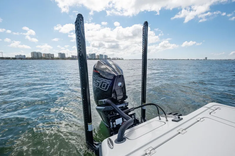 Slide: The Image of 2020 Barker Boatworks 26 Open with powerful outboard motor on open water. - 30