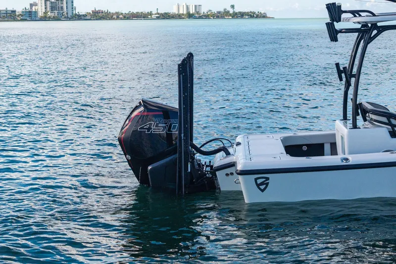 Slide: The Image of 2020 Barker Boatworks 26 Open with powerful outboard motor on calm water. - 5
