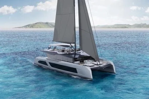 The Image of 2027 McConaghy SAPPHIRE S80 catamaran sailing on clear blue ocean waters. - 1