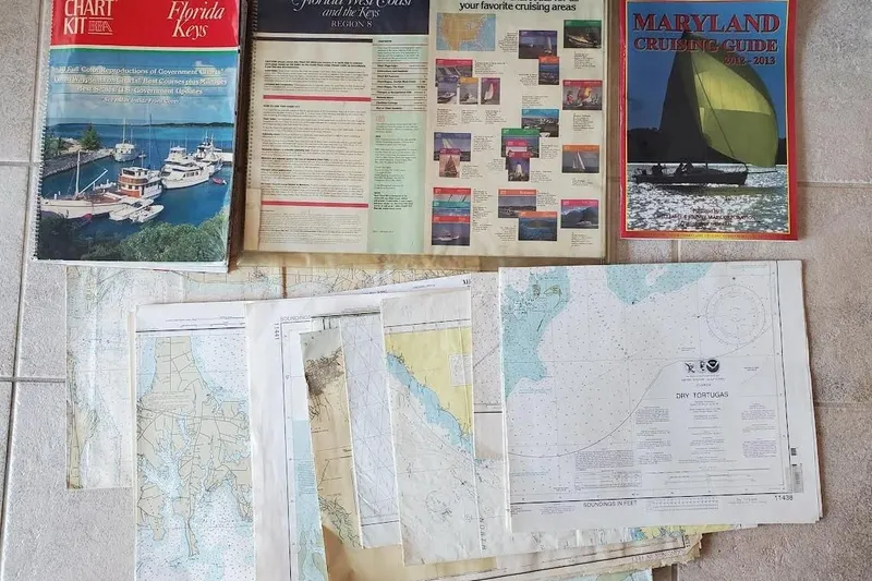 Slide: The Image of Nautical charts and cruising guides for Florida Keys and Maryland, ideal for Island Packet 440 sailing. - 166