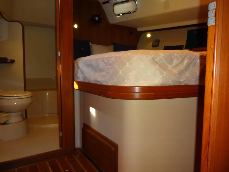 Slide: The Image of Interior cabin of 2006 Island Packet 440 yacht with bed and bathroom. - 33