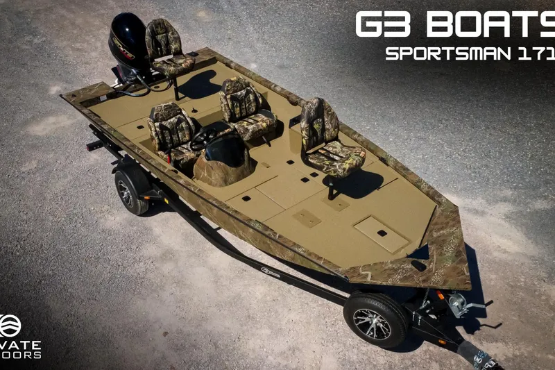 The Image of 2026 G3 Sportsman 1710 boat with camouflage seats and trailer, displayed outdoors. - 0