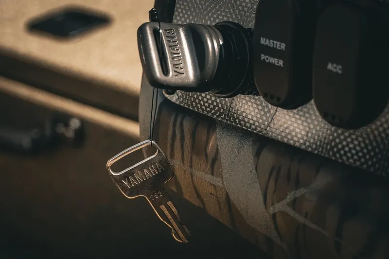 Slide: The Image of Close-up of Yamaha key in ignition of 2026 G3 Sportsman 1710 boat. - 23