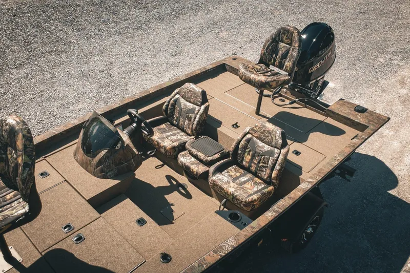 Slide: The Image of 2026 G3 Sportsman 1710 boat with camo seats and steering console. - 4