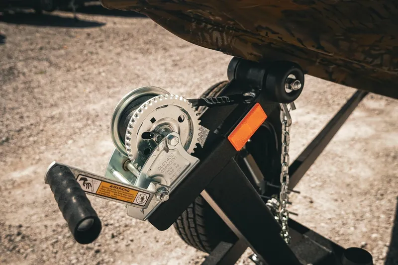 Slide: The Image of Winch mechanism on 2026 G3 Sportsman 1710 boat trailer, close-up view. - 41