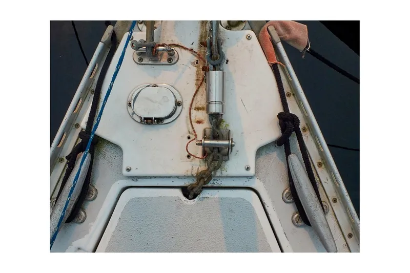 Slide: The Image of 1981 Jensen Marine/Cal Boats 39 MK III deck with anchor chain and ropes. - 10