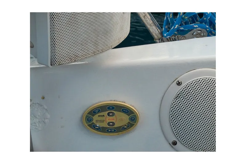 Slide: The Image of 1981 Jensen Marine/Cal Boats 39 MK III with audio controls and speakers on deck. - 24