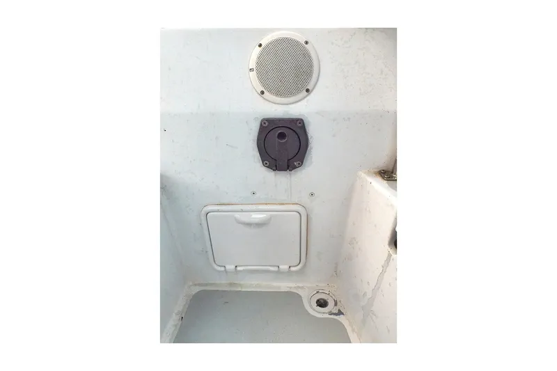 Slide: The Image of 1981 Jensen Marine/Cal Boats 39 MK III interior panel with speaker and access hatch. - 25