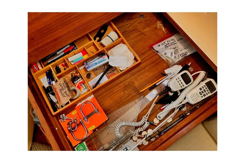 Slide: The Image of Drawer with organized tools, radios, and notes on a 1981 Jensen Marine/Cal Boats 39 MK III. - 39