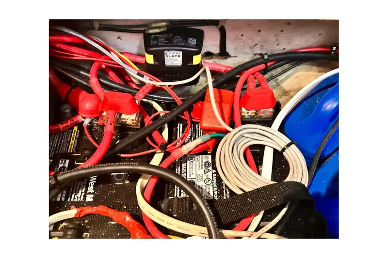 Slide: The Image of Electrical wiring and components inside a 1981 Jensen Marine/Cal Boats 39 MK III. - 69