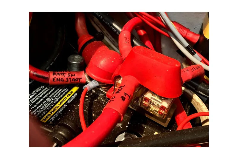 Slide: The Image of Electrical wiring and components inside a 1981 Jensen Marine/Cal Boats 39 MK III. - 70