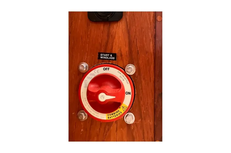 Slide: The Image of Battery switch on 1981 Jensen Marine/Cal Boats 39 MK III, labeled "Start & Windlass." - 71