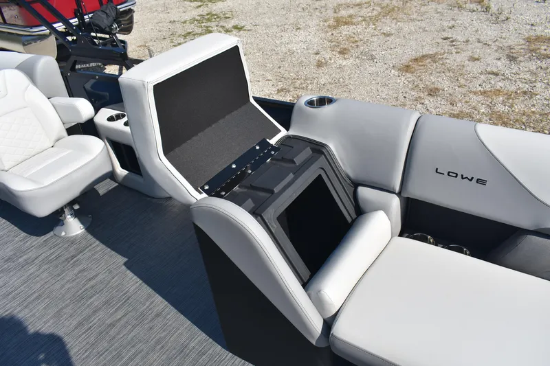 Slide: The Image of Interior of 2026 Lowe SS 230 WV boat with seating and storage compartment. - 20