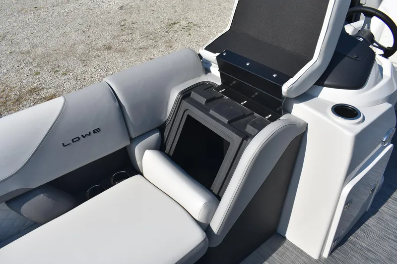 Slide: The Image of 2026 Lowe SS 230 WV boat interior with storage compartment and seating. - 22