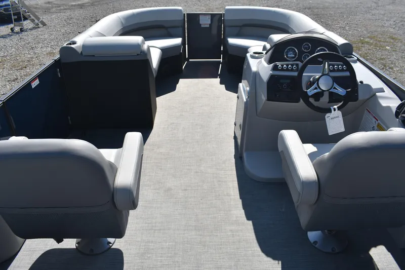 Slide: The Image of 2026 Lowe SS 230 WV pontoon boat interior with modern seating and steering console. - 3