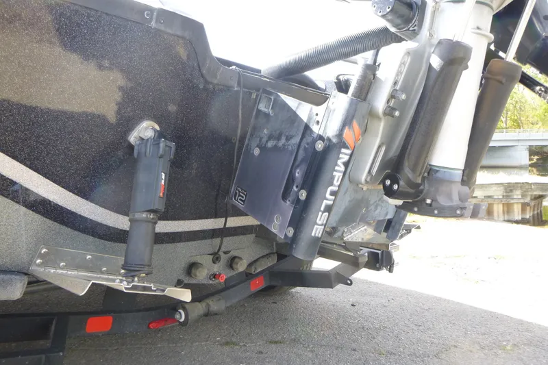 Slide: The Image of 2023 Nitro ZV21 boat with Impulse hydraulic system and motor mount detail. - 14