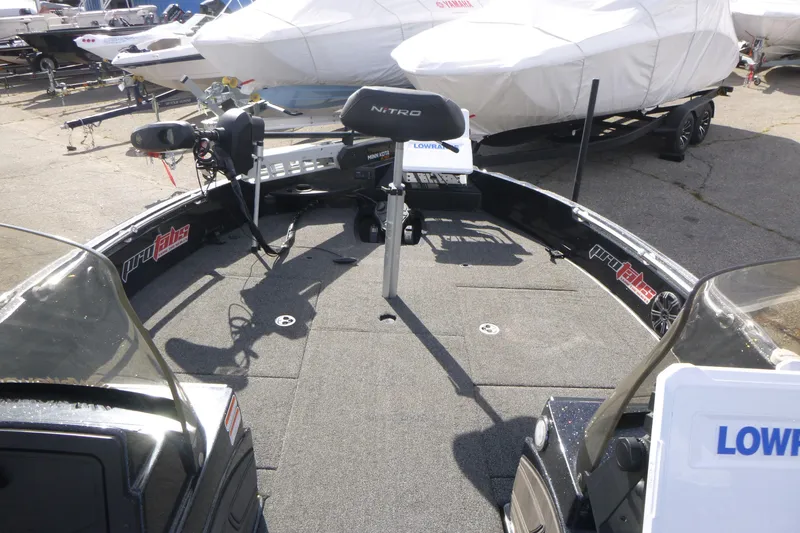 Slide: The Image of 2023 Nitro ZV21 boat deck with trolling motor and Lowrance electronics. - 31