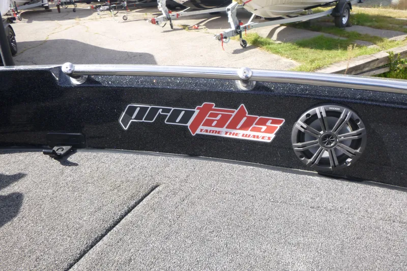 Slide: The Image of 2023 Nitro ZV21 boat interior with ProTabs logo and speaker detail. - 37