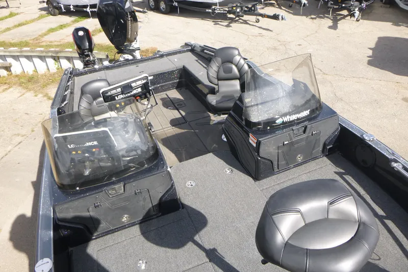 Slide: The Image of 2023 Nitro ZV21 fishing boat interior with Lowrance electronics and comfortable seating. - 40