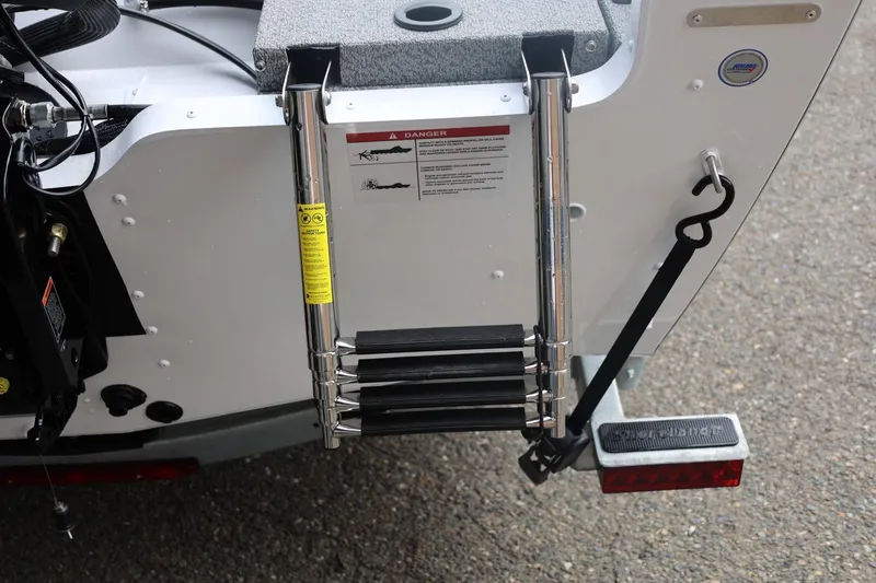 Slide: The Image of 2026 Lund 1775 Adventure Sport boat ladder and safety features. - 15
