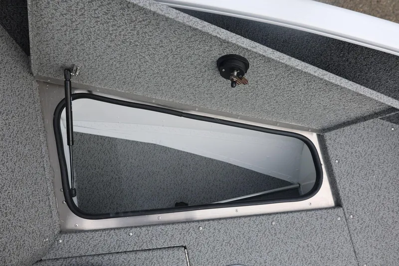 Slide: The Image of 2026 Lund 1775 Adventure Sport boat interior storage compartment detail. - 37