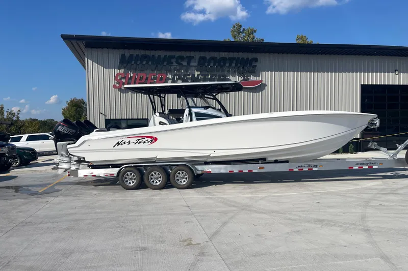 The Image of 2025 Nor-Tech 340 Sport Center Console boat on trailer at Midwest Boating. - 1