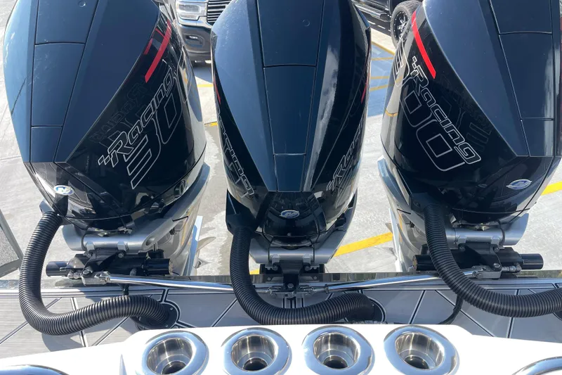 Slide: The Image of Triple Mercury Racing 300 outboard engines on a 2025 Nor-Tech 340 Sport Center Console boat. - 10