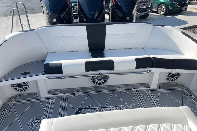 Slide: The Image of 2025 Nor-Tech 340 Sport Center Console, luxurious seating and sleek design. - 11
