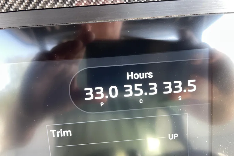 Slide: The Image of Display screen showing engine hours for 2025 Nor-Tech 340 Sport Center Console boat. - 22