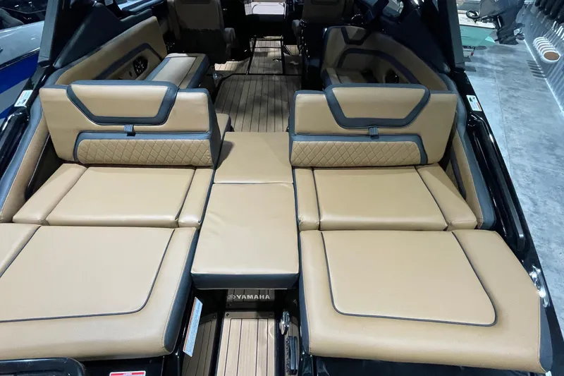 Slide: The Image of Luxurious interior of 2026 Yamaha Boats 275SD with tan leather seating. - 4
