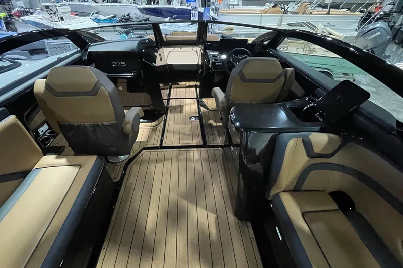 Slide: The Image of 2026 Yamaha Boats 275SD interior with luxurious seating and sleek design. - 5