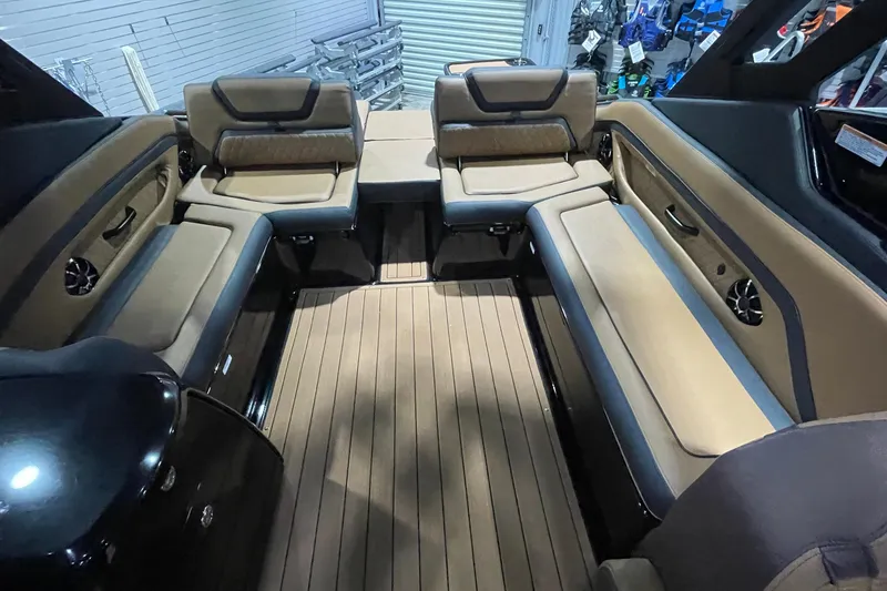 Slide: The Image of 2026 Yamaha Boats 275SD interior with luxurious seating and sleek design. - 7