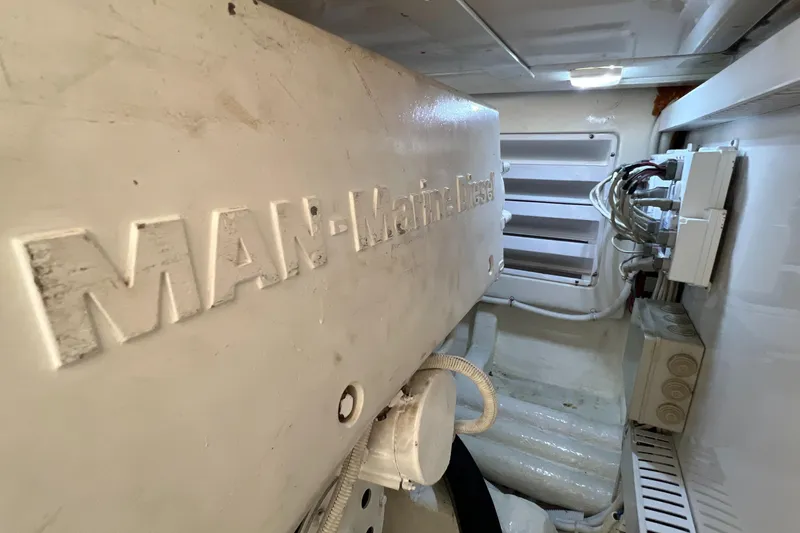 Slide: The Image of Engine room of a 2005 Bertram 450 with MAN Marine Diesel engine. - 22