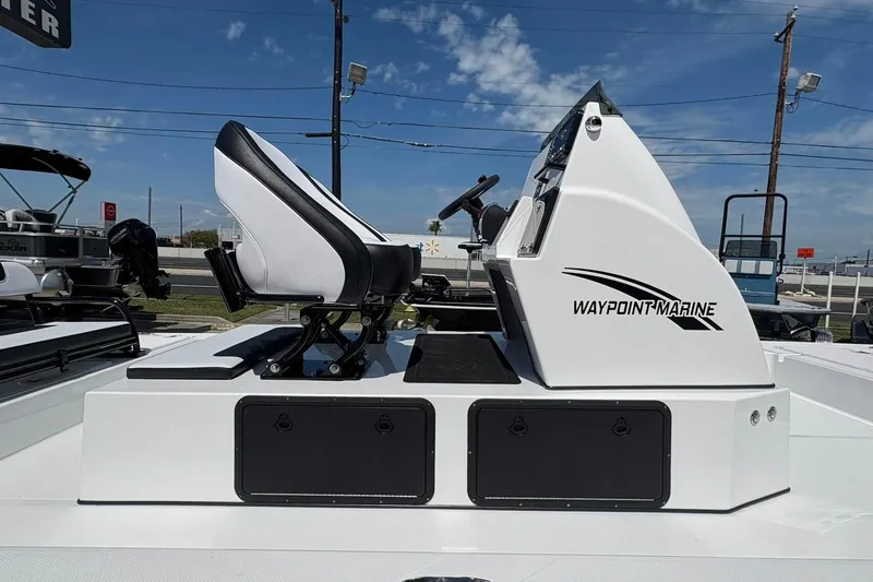 Slide: The Image of 2026 Mamba 24 Cat Elite boat with Waypoint Marine branding, side view. - 16