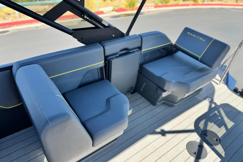 Slide: The Image of Luxurious seating on 2025 Manitou EXPLORE 24 boat with sleek design and modern features. - 15