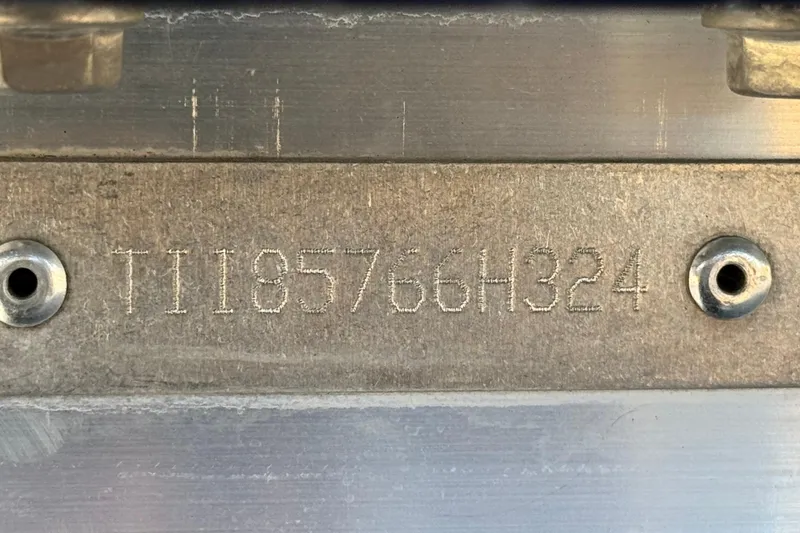 Slide: The Image of Hull identification number on 2024 Manitou Cruise 22 boat. - 26