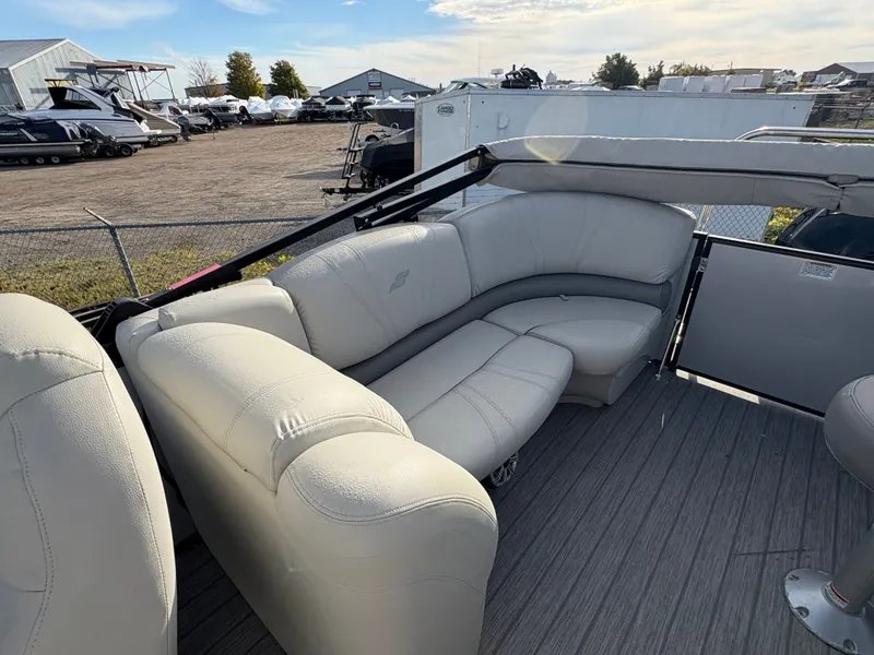 Slide: The Image of 2018 Starcraft CX 23 RE pontoon boat with spacious seating and modern design. - 8