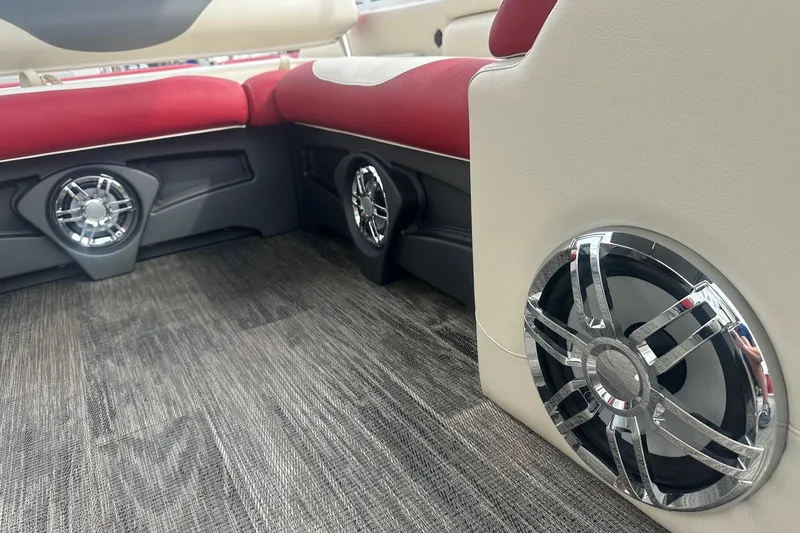 Slide: The Image of 2024 Avalon LSZ 2385 VRB interior with stylish speakers and red seating. - 17
