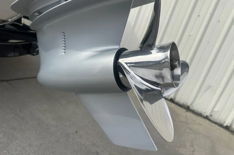 Slide: The Image of Close-up of a 2024 Avalon LSZ 2385 VRB boat propeller, showcasing sleek metallic design. - 8