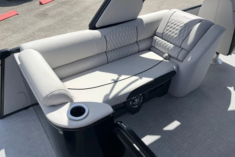 Slide: The Image of 2026 Avalon 2385 Catalina Quad Lounger interior with luxurious seating and modern helm. - 12