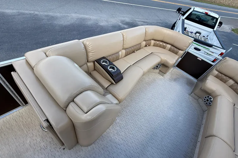 Slide: The Image of Luxurious interior of 2016 Bennington 2550 RSF Arch Tri Toon boat with plush seating. - 21