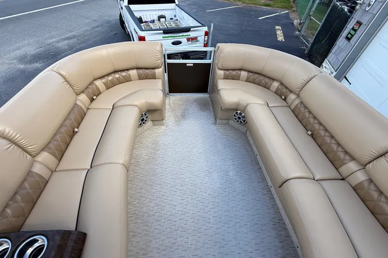 Slide: The Image of Luxurious seating on 2016 Bennington 2550 RSF Arch Tri Toon boat, beige upholstery. - 22