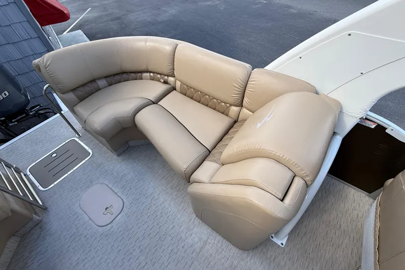 Slide: The Image of 2016 Bennington 2550 RSF Arch Tri Toon with beige leather seating. - 26