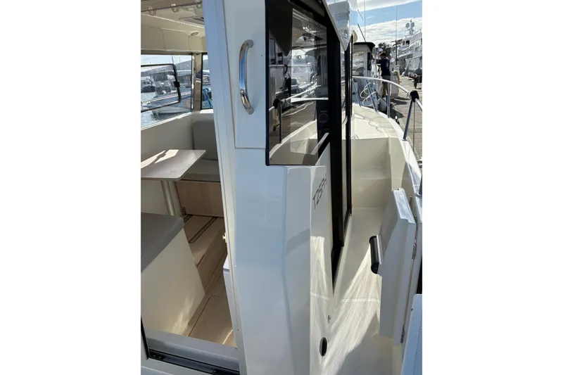 Slide: The Image of 2023 Bayliner Trophy T25 Pilothouse boat interior and exterior view. - 8
