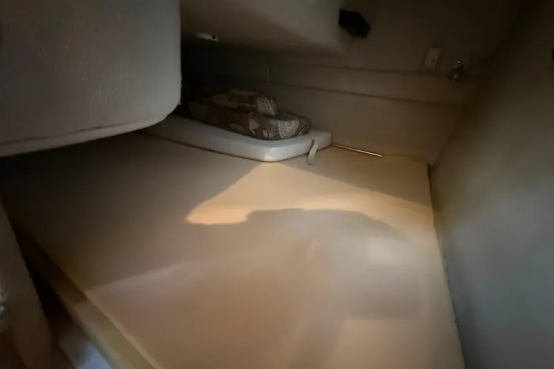 Slide: The Image of 2004 Regal Commodore 2765 cabin interior with cushions and soft lighting. - 10