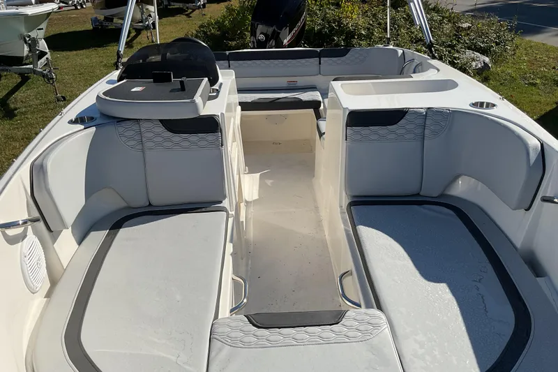Slide: The Image of 2022 Bayliner Element M17 boat interior with spacious seating and modern design. - 11