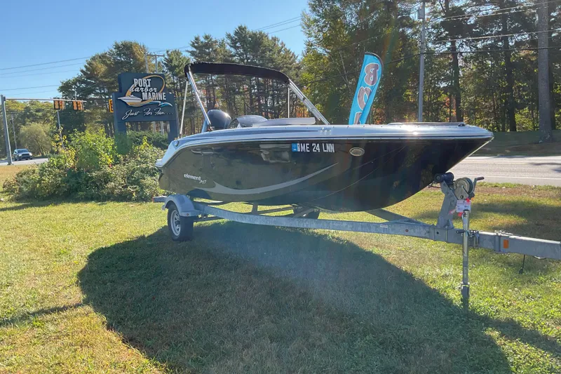 The Image of 2022 Bayliner Element M17 boat on trailer at Port Harbor Marine. - 2