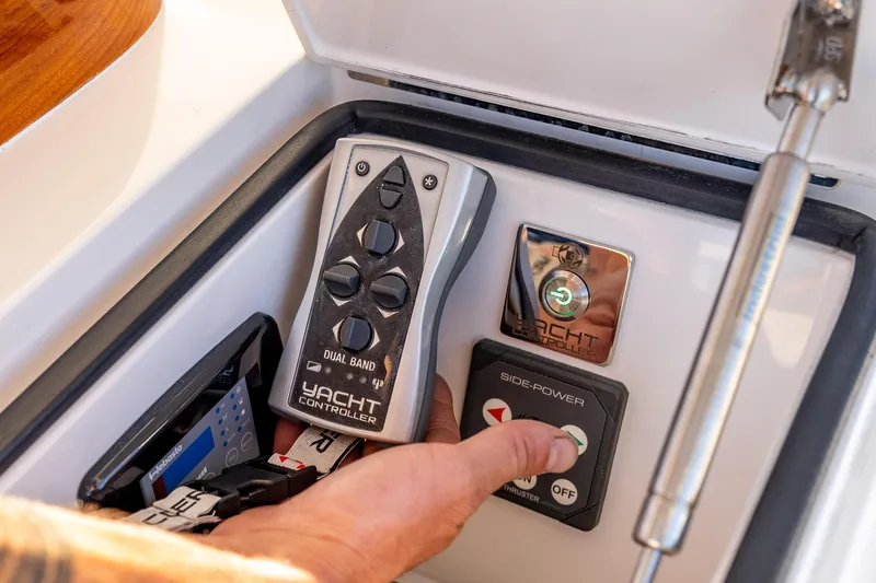 Slide: The Image of Control panel of 2014 Viking 46 Convertible yacht with yacht controller and side-power thruster. - 16