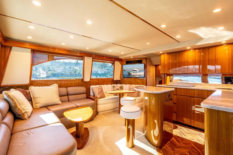 Slide: The Image of Luxurious interior of 2014 Viking 46 Convertible yacht with elegant wood finishes and plush seating. - 19