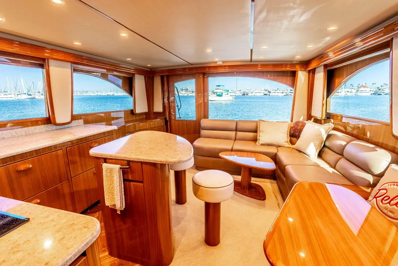 Slide: The Image of Luxurious interior of 2014 Viking 46 Convertible yacht with elegant wood finishes and ocean view. - 25